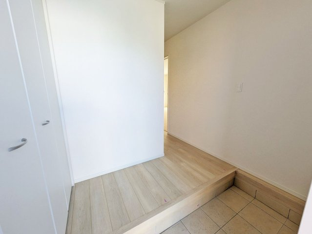 天井の高さまである大型のシューズボックスで家族の靴が増えても安心